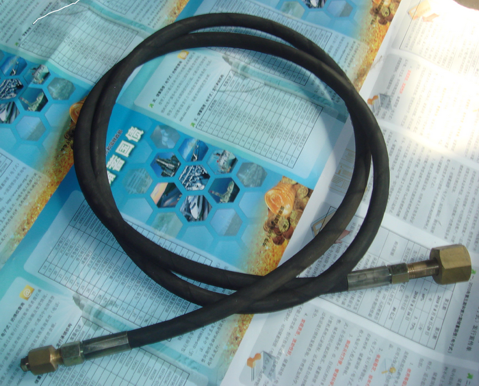 Air bag inflation hose assembly