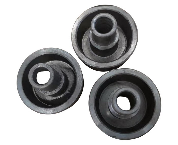 Discharge valve spring cover